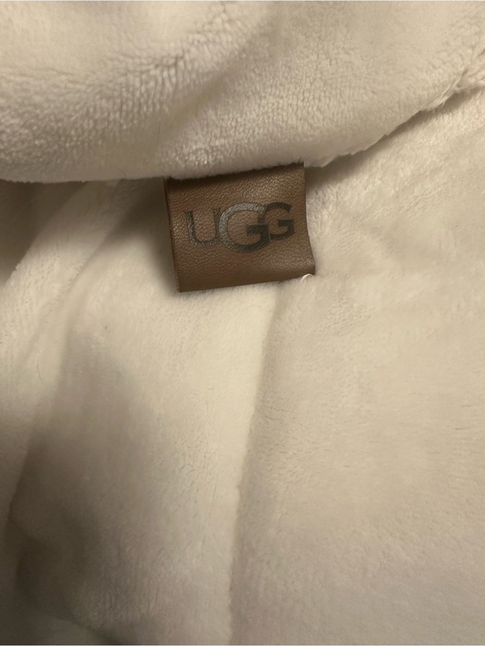 UGG Cream Faux Fur Throw with Brown Leather Logo Tab